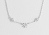 Estella Bartlett Triple Flower White Enamel Necklace