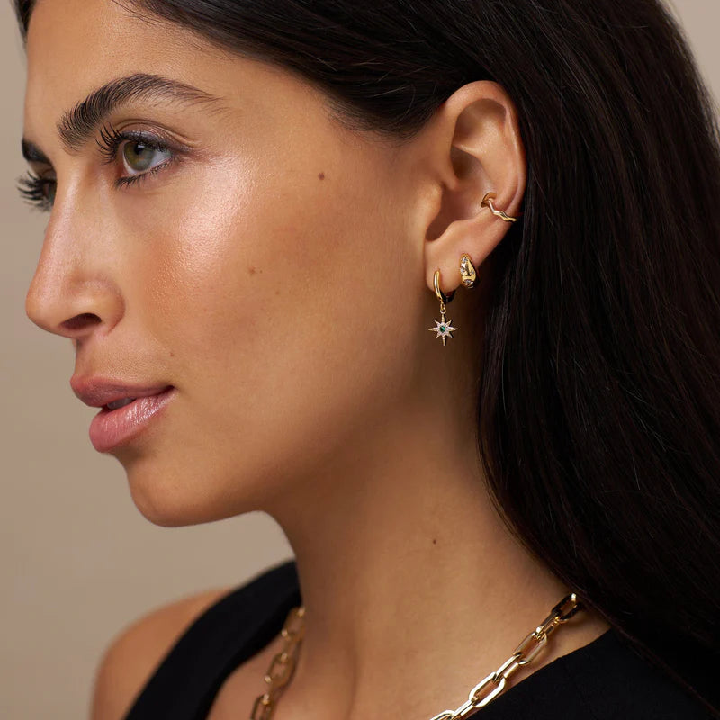Orelia Tapered Crystal Starburst Huggie Hoop Earrings